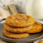 A stack of soft and chewy Homemade Fall Cookies coated in cinnamon sugar, showcasing Pumpkin Spice Baking Recipes and Easy Fall Sweet Treats, perfect for Super Easy Fall Desserts, Southern Fall Desserts, Fun Fall Cookies, Pumpkin Bar Cookies, Autumn Desserts Recipes, and Best Fall Cookies Recipes.