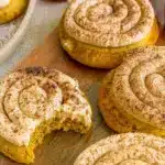 A plate of Homemade Fall Cookies – soft, chewy Cinnamon Pumpkin Cookies topped with creamy frosting, perfect for Fall Inspired Baking Recipes, Fall Treats Baking, and Cute Fall Baking Recipes.