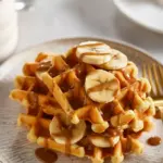 Stack of golden, fluffy Protein Waffles With Toppings like fresh berries, yogurt, and syrup — a high-protein, Macro Friendly Breakfasts recipe perfect for Sweet Breakfast Meal Prep or a quick Keto Protein Breakfast packed with 50 Grams Of Protein.