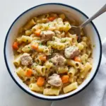 Bowl of Creamy Chicken Pot Pie pasta with egg noodles, shredded chicken, and veggies in a rich sauce — a cozy comfort food favorite for Pasta Dinner Recipes, perfect One Pot Meals, and easy Chicken Dinner Recipes nights.