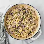 Creamy Ground Beef Stroganoff piled on egg noodles with parsley, a quick Fast Dinner Recipe that’s family-friendly.