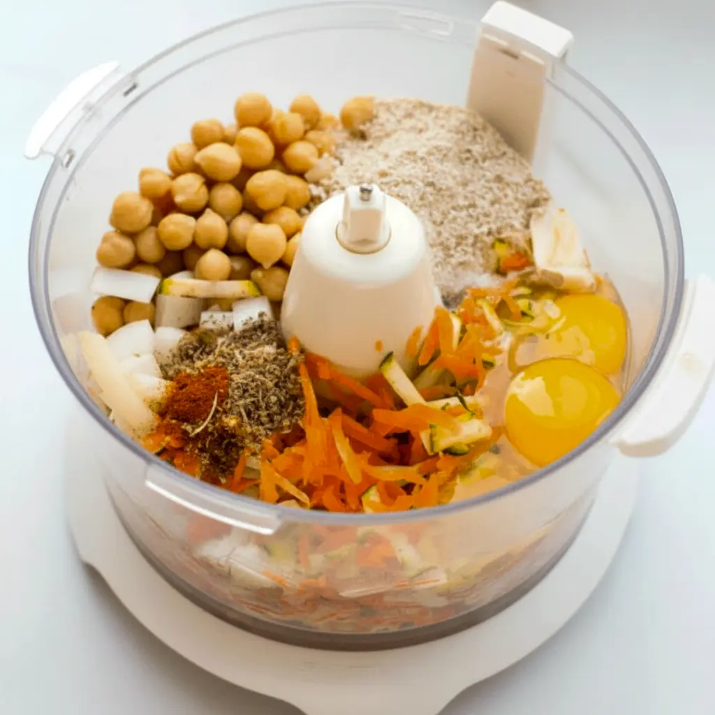 A plate of golden Chickpea Vegetable Nuggets served with dipping sauce, showing a crispy Kids Veggie Nuggets Recipe that looks healthy, simple, and kid-friendly.