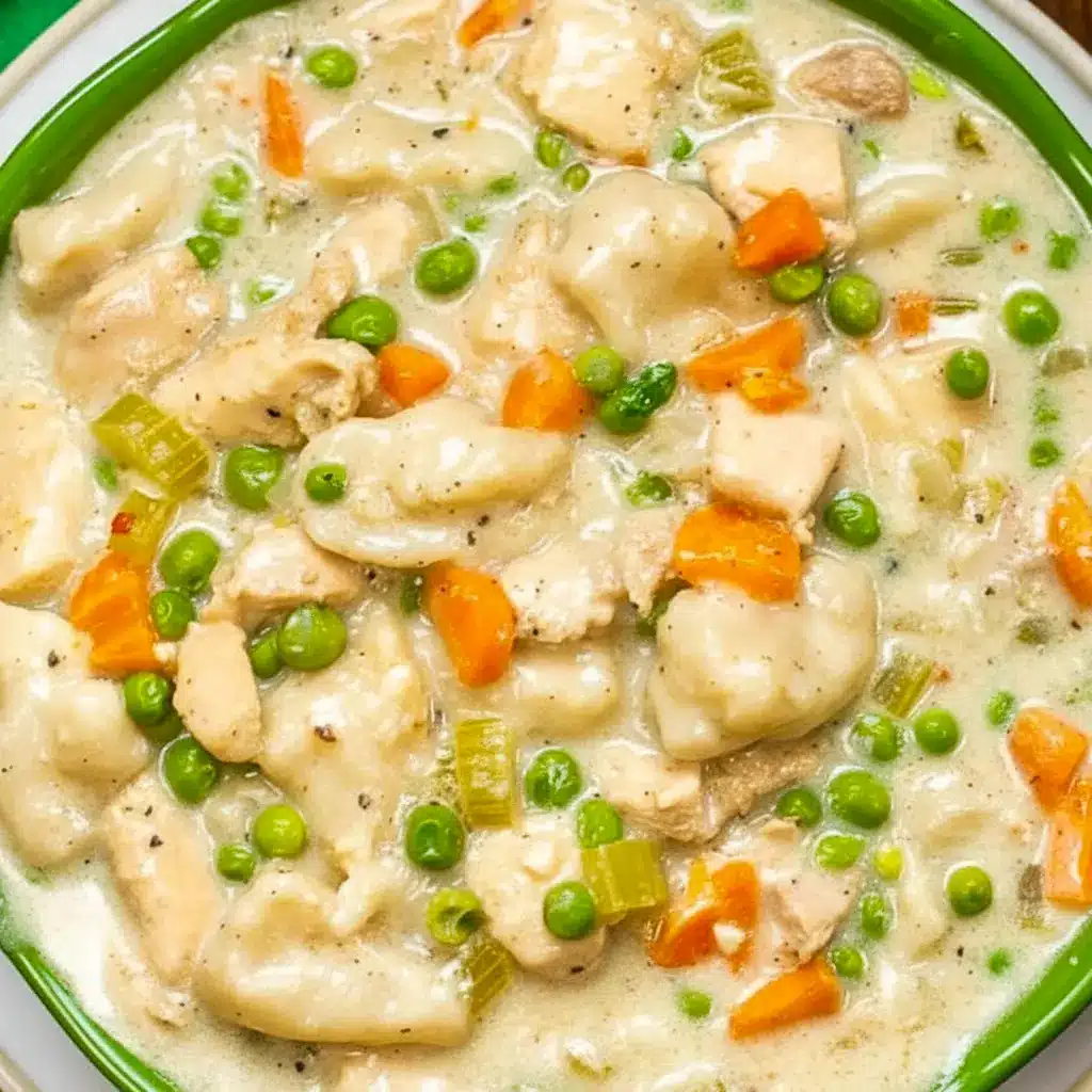 Instant Pot Chicken and Dumplings in a creamy bowl with tender chicken, vegetables, and fluffy dumplings, showing a hearty Chicken Dumplings Instant Pot comfort food recipe.