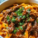 A steaming bowl of Korean Beef Noodles served as a cozy example of Food Ideas With Beef for an easy dinner.
