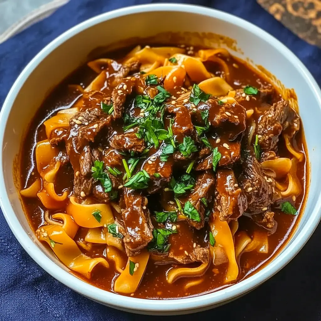 A steaming bowl of Korean Beef Noodles served as a cozy example of Food Ideas With Beef for an easy dinner.