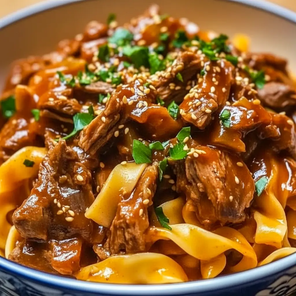 A steaming bowl of Korean Beef Noodles served as a cozy example of Food Ideas With Beef for an easy dinner.