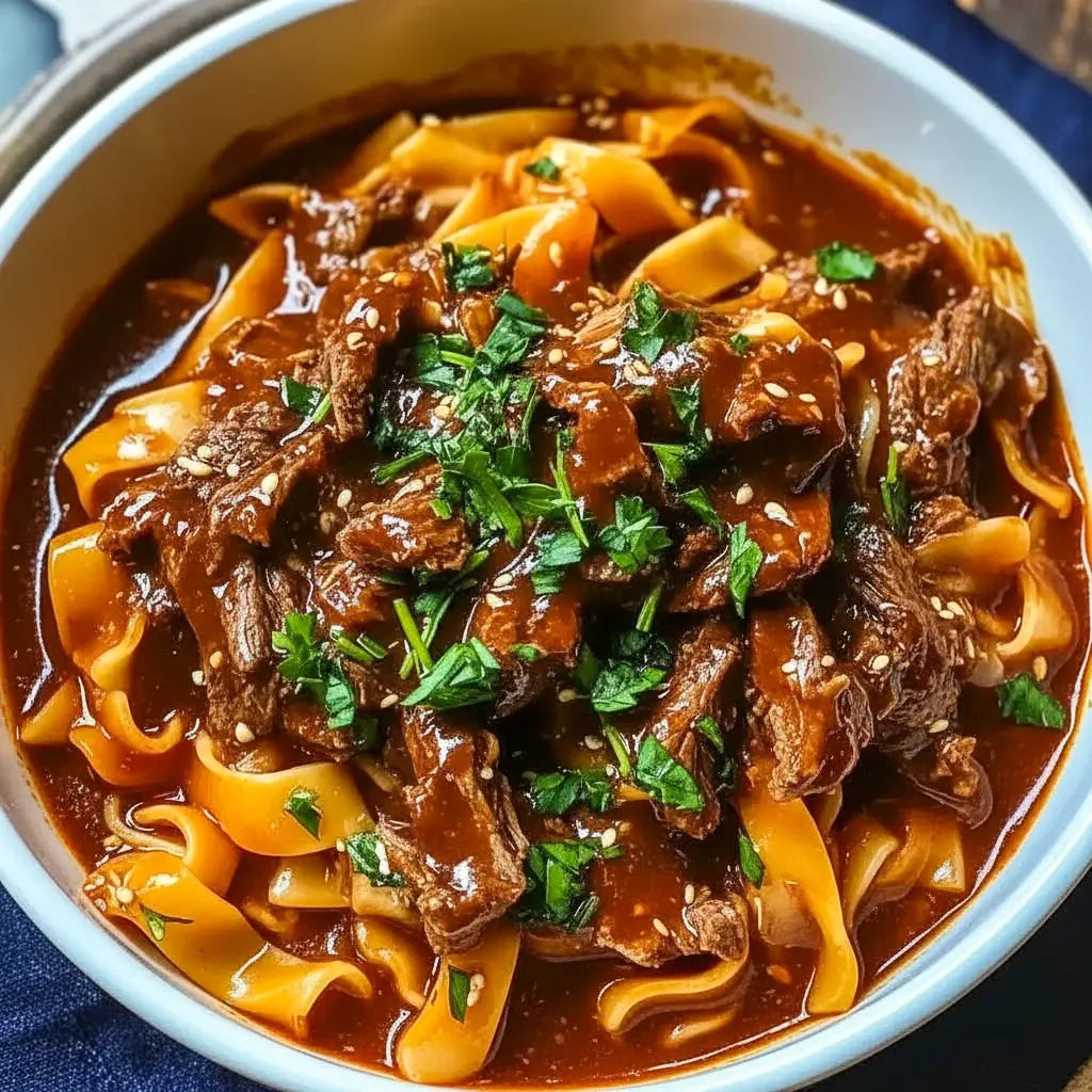 A steaming bowl of Korean Beef Noodles served as a cozy example of Food Ideas With Beef for an easy dinner.