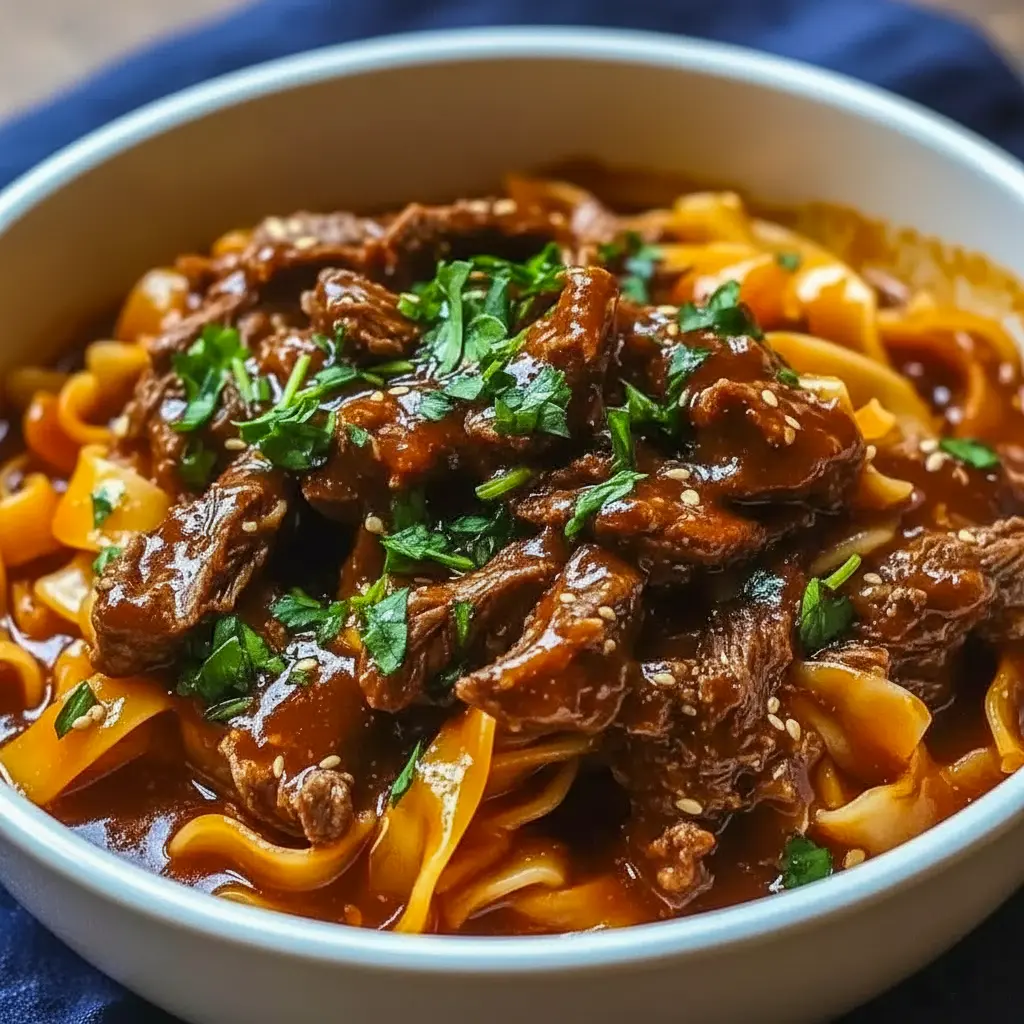 A steaming bowl of Korean Beef Noodles served as a cozy example of Food Ideas With Beef for an easy dinner.