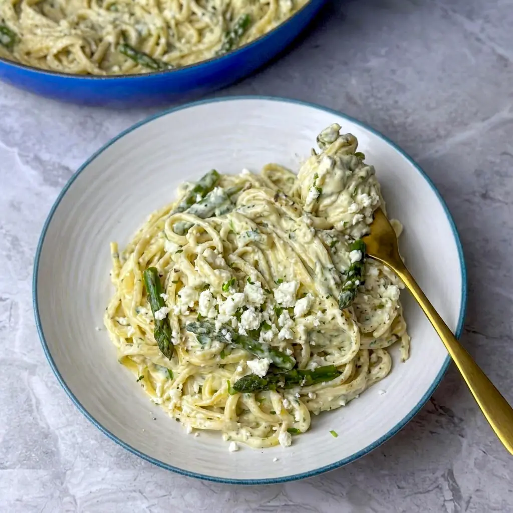 Fresh and tangy Creamy Lemon Feta Pasta with asparagus and lemon, perfect for What To Make With Feta inspiration.