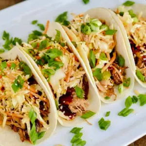 Korean BBQ Tacos piled with tender pork and tangy slaw, a delicious Korean Tacos Recipe Easy for dinner.