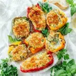 Warm Ricotta Stuffed Peppers served with a golden topping, creamy filling, and a bright Fresh Paprika finish for an easy Italian-style side dish.