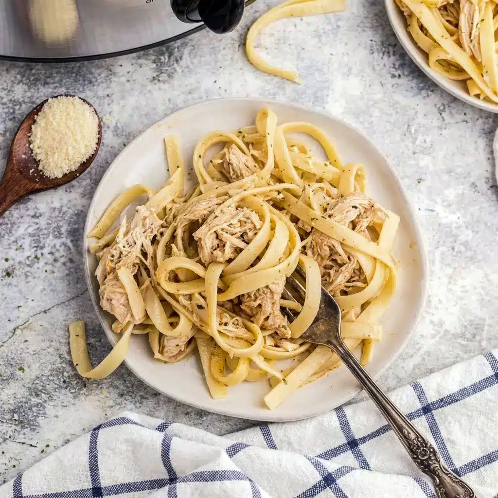 Cajun Chicken Alfredo in a creamy slow cooker pasta dish with bold Cajun Pasta Crockpot flavor and tender chicken.