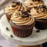 A close-up tray of Espresso Brownie Cupcakes topped with silky frosting, perfect for Coffee Cupcakes With Coffee Buttercream lovers.