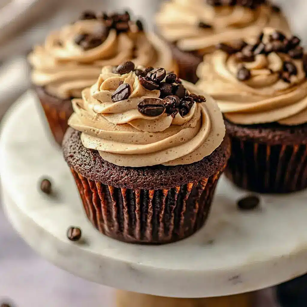 A close-up tray of Espresso Brownie Cupcakes topped with silky frosting, perfect for Coffee Cupcakes With Coffee Buttercream lovers.
