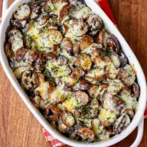 A warm baked dish of Cheesy Mushroom Casserole with rich golden topping, perfect for What To Make With Lots Of Mushrooms.