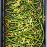 A close-up of Roasted Parmesan Green Beans with a crispy golden topping, perfect for Healthy Carbs Side Dishes at an easy family dinner.