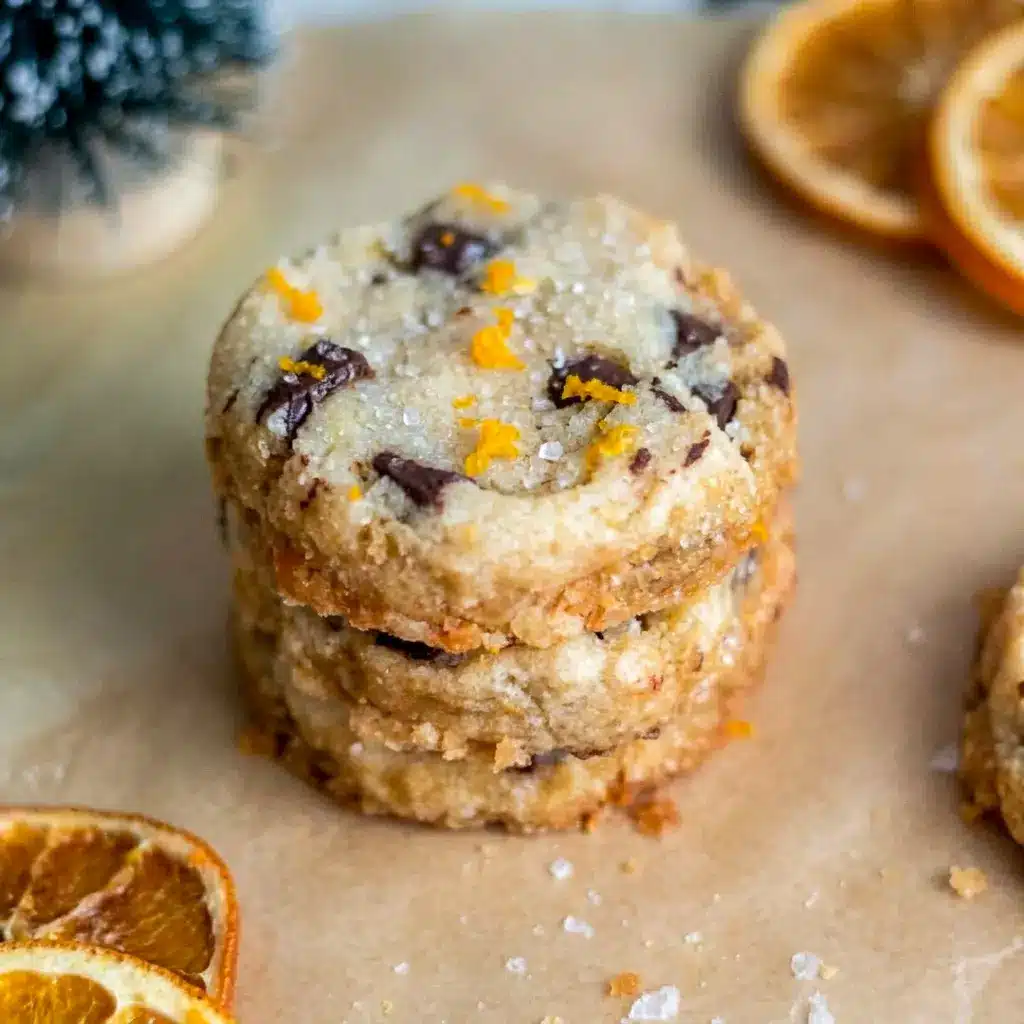 Dark Chocolate Orange Shortbread Cookies styled as Trendy Cookies for festive baking inspiration, featuring a rich chocolate drizzle and sugared edges.