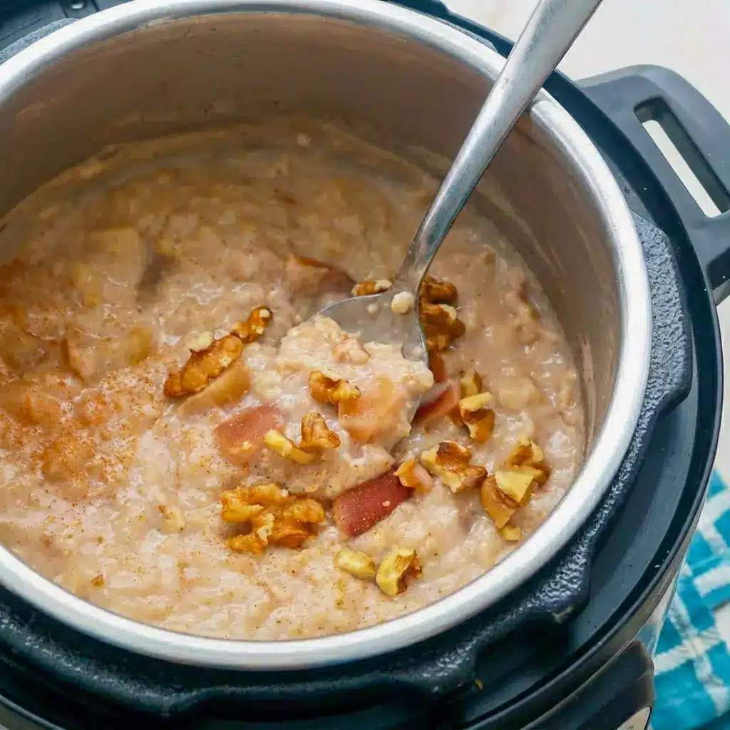 Cozy breakfast image of Instant Pot Apple Cinnamon Oatmeal with creamy texture, a simple Pressure Cooker Oatmeal idea for busy mornings.