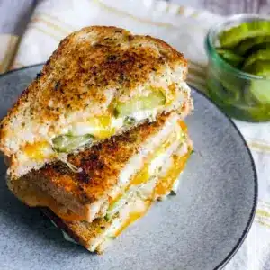 The Dill Pickle Grilled Cheese Sandwich melts over garlicky sourdough, making one of those cozy Dinner Ideas With Sourdough Bread that feels oddly perfect.