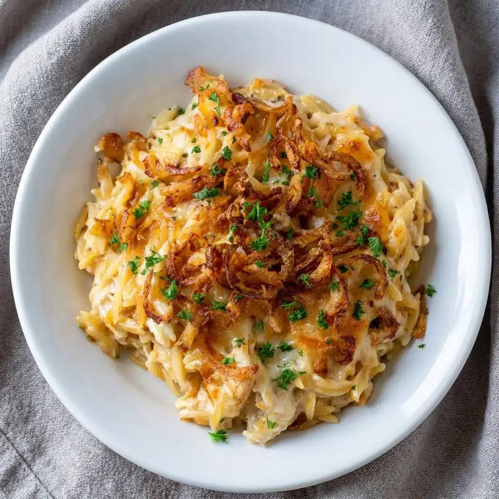 This bubbling French Onion Chicken Orzo Casserole highlights Creamy Orzo Pasta and tender chicken for an easy, crave-worthy comfort meal.