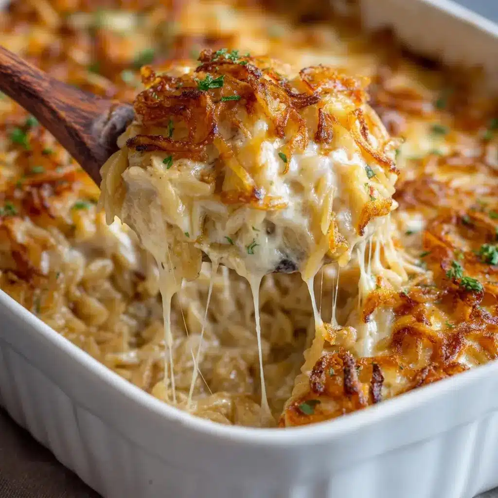 A rich and cheesy French Onion Chicken Orzo Casserole made for fans of Orzo Recipes, with a creamy texture and classic onion flavor in every bite.