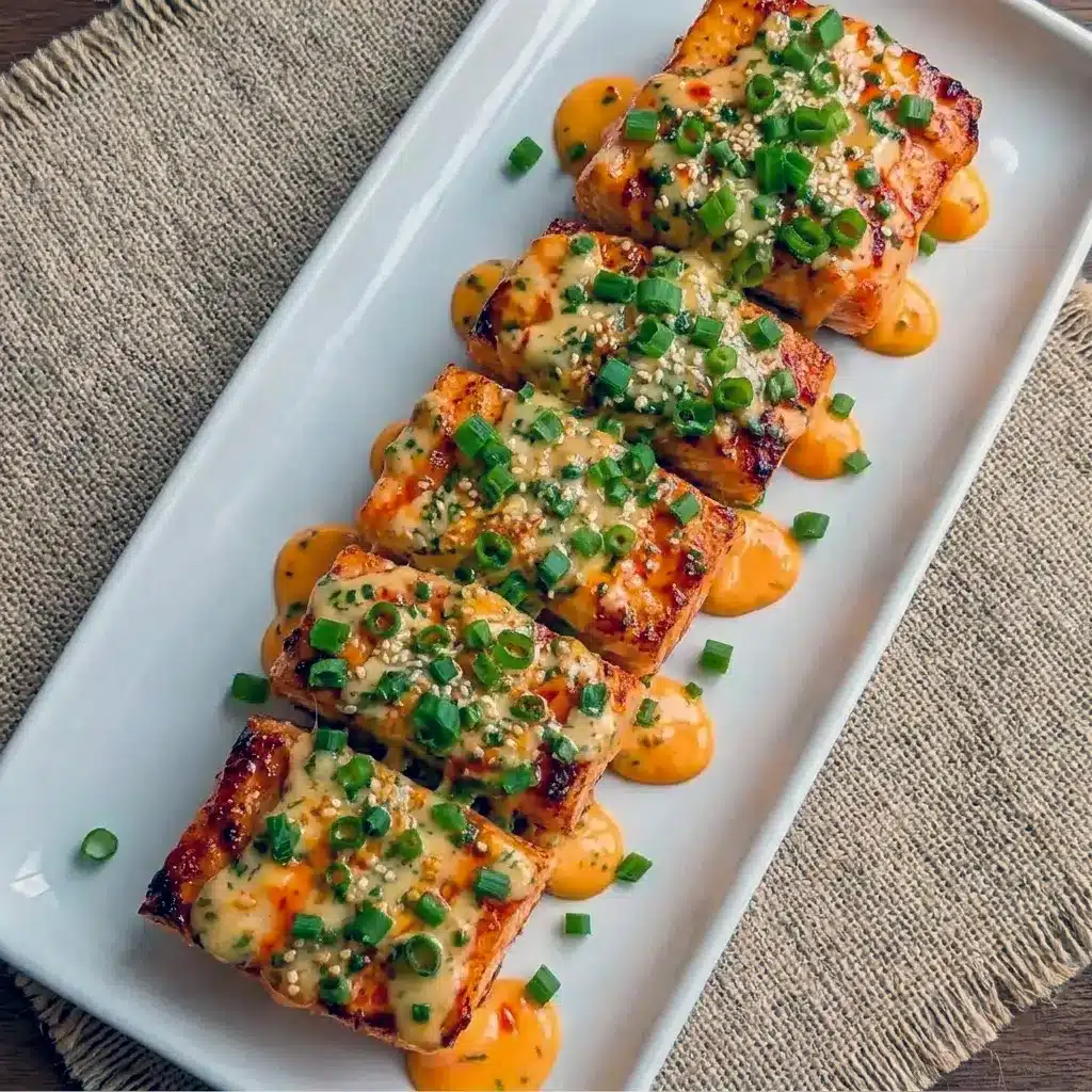 A delicious plate of Bang Bang Salmon with creamy spicy sauce, ideal for Simple Salmon Meals that come together quickly.