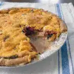 Golden, bubbling Best Southern Tomato Pie fresh out of the oven, made with a simple tomato pie filling recipe.