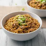 Tender chicken and saucy noodles make Crockpot Honey Garlic Chicken With Noodles an irresistible dinner inspired by Crock Pot Ideas Easy.